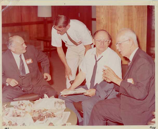 A quartet of eminent mycologists at the Knoxville 1968 MSA meeting. From left to right, Albert Pilát, talking to Ernst Both; and Alexander Smith talking to Walter Snell. Photo courtesy of Dr. Wayne Gall.
